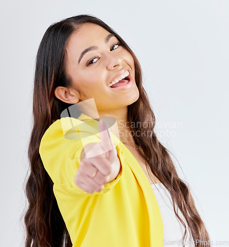 Image of Portrait, support and woman with thumbs up, achievement and like symbol against a white studio background. Winning, female person or model with hand gesture, sign or positive with review or agreement