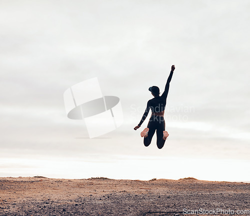 Image of Wellness, fitness goals and woman jump in nature for achievement, success and celebrate workout Sports, mockup space and happy female person with hands in air for exercise, training or running target