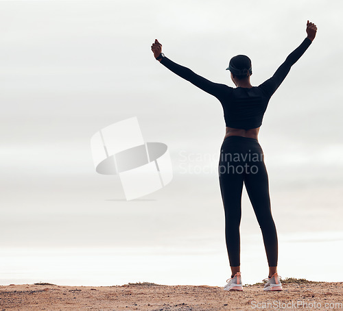 Image of Celebration, fitness and back of woman in nature with achievement, success and workout goals. Sports, mockup space and happy female person with hands in air for exercise, training and running target