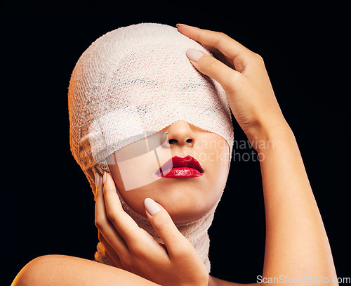 Image of Headscarf, fashion and a woman with makeup on a dark background for retro or vintage aesthetic. Beauty, stylish and a girl or model with fashionable or trendy style isolated on a studio backdrop