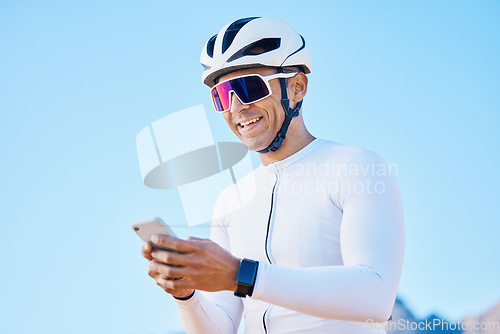 Image of Cyclist, relax or happy man with phone on social media for sports, training exercise or fitness workout. Smile, break or male biker resting with mobile app for networking, browsing or searching info