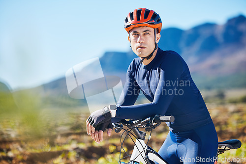 Image of Relax, thinking or man cycling on a bicycle for training, cardio workout and exercise on mountain road. Fitness, energy recovery or tired sports athlete biker resting on a break or trail adventure