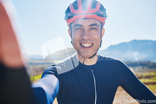 Image of Selfie, portrait or happy man cycling by mountains on countryside in Switzerland for fitness. Face, smile or sports athlete biker with photo or profile picture in training, workout or exercise trip