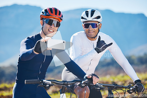 Image of Fitness, bike and selfie with friends in nature for cycling, taking a break from a cardio or endurance workout. Exercise, mountain and man cyclist team taking a picture together while sports training