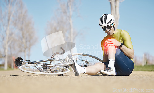 Image of Cycling, injury and man with knee pain in a road after fitness, training or morning cardio workout routine. Bicycle, accident and male cyclist with leg problem, fibromyalgia or arthritis while riding