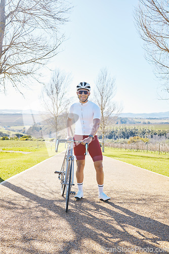 Image of Fitness, bicycle or happy man ready for cycling for training workout and exercise outdoors alone. Start, smile or healthy male sports athlete riding a bike on a road or path for freedom or wellness