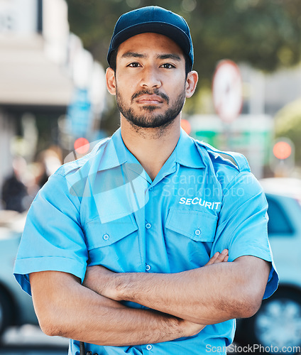 Image of Security guard, portrait and safety officer man on the street for protection, patrol or watch. Law enforcement, serious and duty with a crime prevention male worker in uniform outdoor in the city