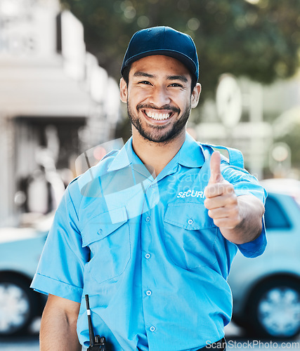 Image of Security guard, thumbs up and safety officer man on the street for protection, patrol or watch. Law enforcement, happy and portrait of crime prevention male worker in uniform in city for good service