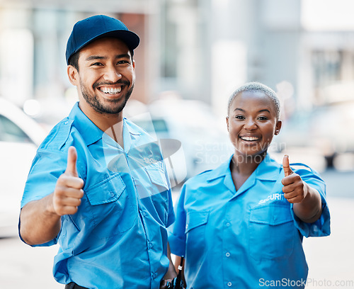 Image of Security guard, safety officer and team thumbs up on street for protection, trust or support. Law enforcement, happy and hand sign of crime prevention man and black woman in uniform outdoor in city