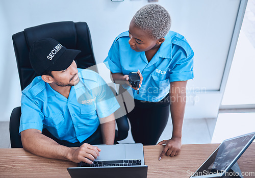 Image of Security guard, safety officer and team in office with a laptop and walkie talkie for surveillance. Man and black woman working together for crime prevention, communication and law enforcement