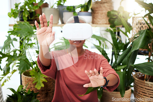 Image of Woman, virtual reality and headset with hands at home for metaverse, 3d world or future. Black person with plants and vr glasses for ecology, ai and touch for interaction, video game or experience