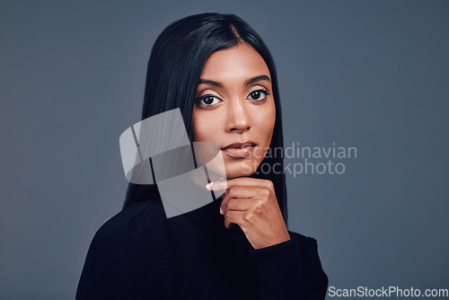 Image of Serious face, beauty and skincare of woman in studio isolated on a gray background mockup space. Portrait, natural and Indian model with spa facial treatment for aesthetic, healthy skin and cosmetics