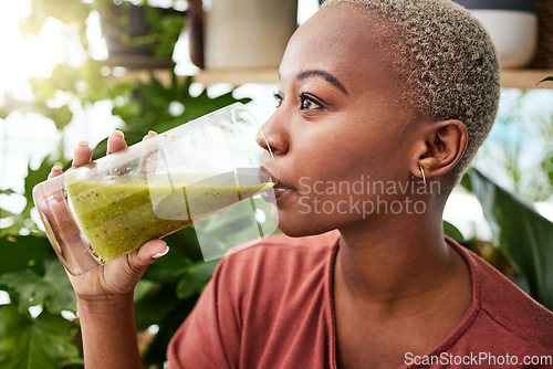 Image of Black woman, diet and drinking natural smoothie for vitamins, fiber or health and wellness in store. Face of African female person with healthy beverage, drink or organic fruit juice to lose weight