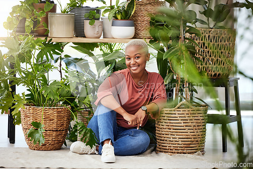 Image of Black woman, plants in a basket and relax with nature, gardening and sustainability with environment. African female person, eco friendly and smile in portrait, happy with botany and green leaves