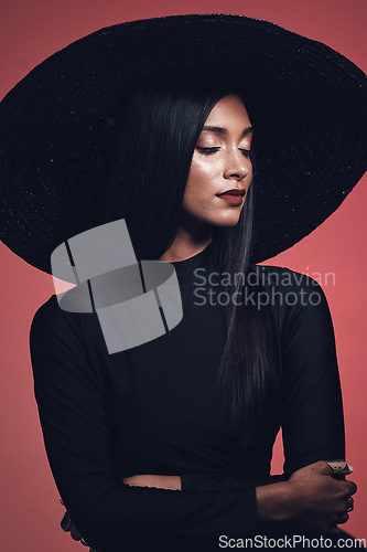 Image of Fashion, woman in hat with beauty and makeup, elegance and glamour with luxury isolated on studio background. Designer clothes, black aesthetic and female model with style, vintage and cosmetic shine