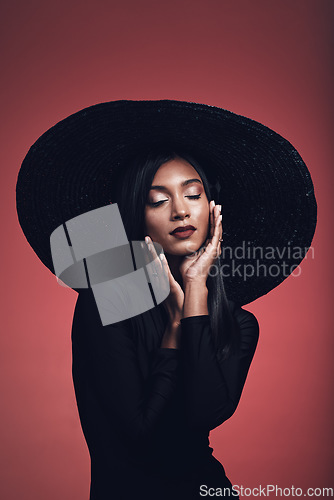 Image of Fashion, beauty and woman in vintage hat and studio makeup, cosmetics and confidence in creative, luxury or designer clothing. Indian model, retro style and elegant accessories for stylish event