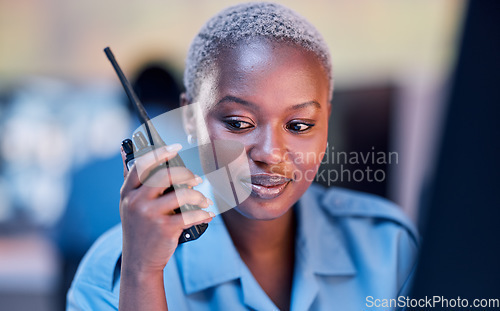 Image of Security dispatch, police or woman with walkie talkie for communication to monitor CCTV or surveillance. Emergency radio, crime safety or guard listening to criminal problem, theft or crisis at night