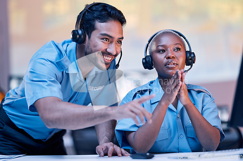 Image of Security, surveillance and a man training a black woman in a control room for safety or law enforcement. Teamwork, office and headset with a private guard team watching a monitor for crime prevention