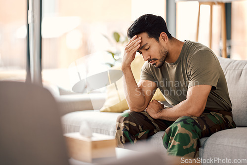 Image of Man with headache, stress and mental health problem, therapy and psychology, depressed and sitting on couch. Male person in crisis, migraine and medical issue, sad with depression and pain at home