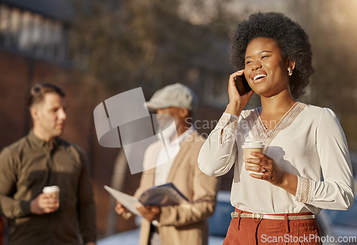 Image of Phone call, coffee and a business black woman in town for communication on her morning commute. Mobile, contact and travel with a happy young female employee walking outdoor in an urban city
