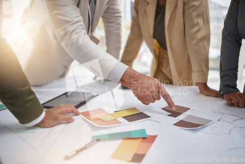 Image of Creativity, color palette and team in a meeting for an interior design project in office boardroom. Industry, collaboration and group of designers in discussion working with blueprints in workplace.