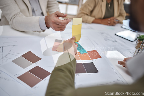 Image of Creative, color sample and team in a meeting for an interior design project in office boardroom. Industry, collaboration and team of designers in discussion while working with blueprints in workplace