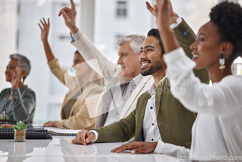 Image of Meeting, seminar and questions with business people hands raised in the boardroom during a strategy session. Planning, workshop and a group of colleagues or employees volunteering to answer at work