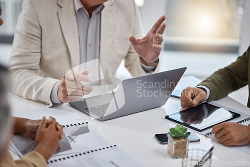 Image of Hands, meeting and leader planning on laptop and mentor, staff and conversation with team, management or coaching. Business, people working and speaking about goals, target or leadership on project