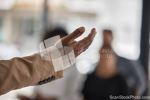 Image of Hand, presentation and leadership with a coach in the boardroom teaching a a business team during a workshop. Management, training and a corporate boss talking to staff for education at a conference