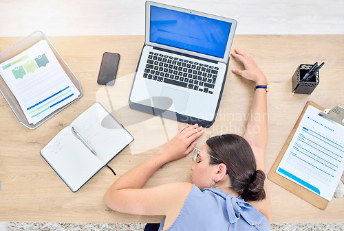 Image of Woman, sleeping on desk and tired employee in office with burnout, fatigue and top view of nap on workplace table. Business, person and working overtime or sleep from exhausted and low energy