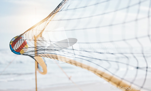 Image of Volleyball, net and speed at beach sports for fitness, exercise or training in summer. Holiday, sun and equipment for game or competition by the ocean in the morning for cardio or a game for vacation