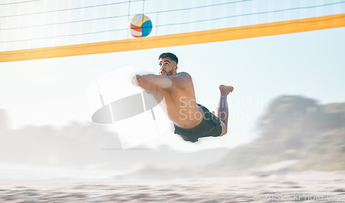 Image of Volleyball, diving and man jump at beach in air for fun competition, contest and motion blur. Male person, outdoor fitness and hit ball at sand by sea for summer games, action and energy performance