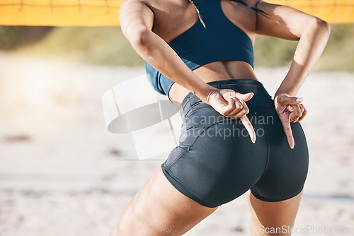 Image of Beach, fitness and a woman with volleyball hand sign for communication or block signal. Behind female person or healthy athlete body ready for sports, workout or fun game outdoor on sand in summer