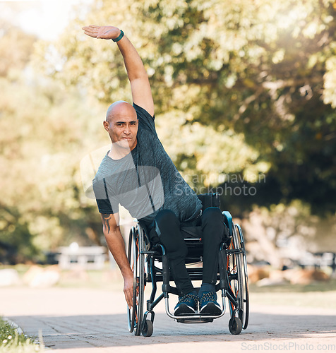 Image of Stretching, workout and man with a disability in park for fitness and health portrait. Warm up, wellness and exercise with wheelchair user training in nature for sports, challenge and performance