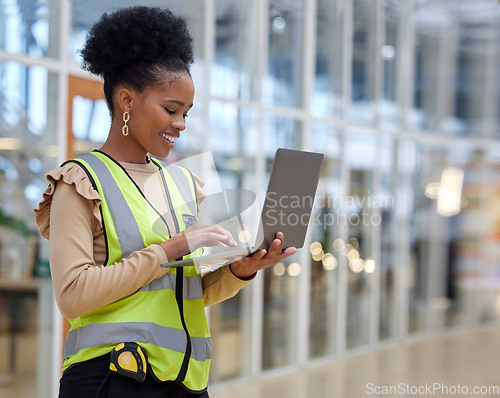 Image of Project, woman and contractor with laptop at constriction site with architect or planning with employee. Engineer, working and technology with project management for renovation or maintenance.