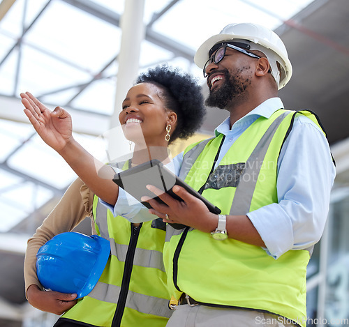 Image of Tablet, teamwork or engineer talking to designer planning on a construction site for architecture. Building, collaboration or black woman or happy man working together to design a development project