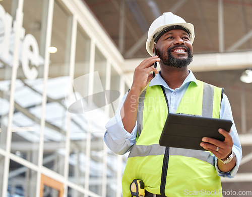 Image of Phone call, black man and engineer with tablet for talking, planning and working on construction project. African architect, mobile technology and happy contractor on internet, email and thinking.