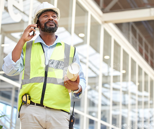 Image of Phone call, black man and architect with blueprint, talking and planning to work on construction project. African engineer, mobile technology and contractor speaking, communication and discussion.