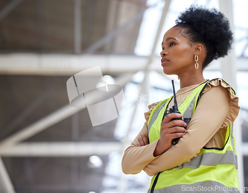 Image of Woman, construction and walkie talkie at worksite for project with inspection at building with planning. Architect, girl and radio for contractor or leadership and worker with technology or ideas.