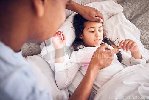 Image of Thermometer, nursing and a man with a sick child for a fever, temperature check or virus. Family, house and a dad with a medical tool and a girl kid in the bed with a health problem or headache