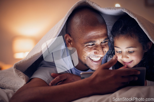 Image of Happy father, child and tablet at night, bedroom or home for online games, reading ebook or storytelling with blanket. Excited dad, girl and streaming cartoon movie on digital tech, media or internet