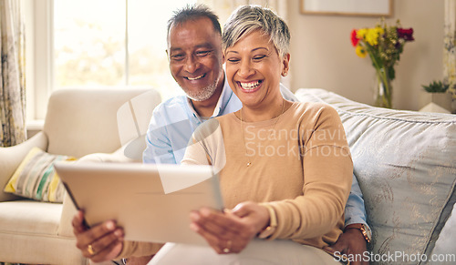 Image of Tablet, video call and senior couple at home for communication, network connection or chat. Mature man and woman together with technology, social app and internet while laughing on a living room sofa