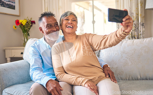 Image of Senior couple, selfie and laughing at home for social media, network connection or memory. Mature man and woman together with smartphone for a profile picture with a smile and love on a lounge sofa