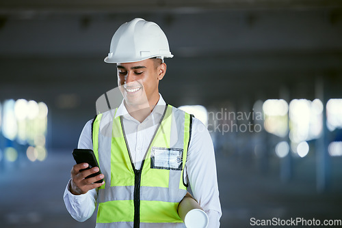 Image of Architecture, phone and happy man with blueprint, reading email or social media at construction site in communication. Engineer with cellphone, typing message with safety and planning with smile.