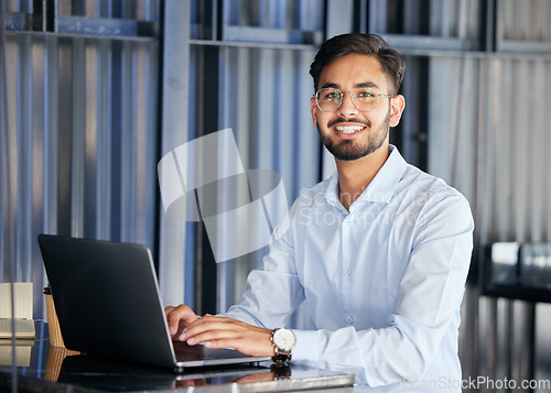 Image of Portrait, business and man with a laptop, typing and connection with digital software, planning and network. Male person, employee and consultant with a pc, office and planning with data analysis
