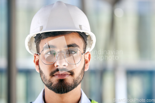 Image of Architecture, serious and portrait of man on construction site for engineering, design and building. Labor, real estate and property with face of contractor for renovation, builder and maintenance