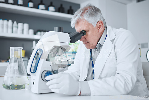 Image of Medical, research or man with a microscope, laboratory or science with a breakthrough, review and check sample. Male person, researcher or scientist with lab equipment, studying particles or analysis