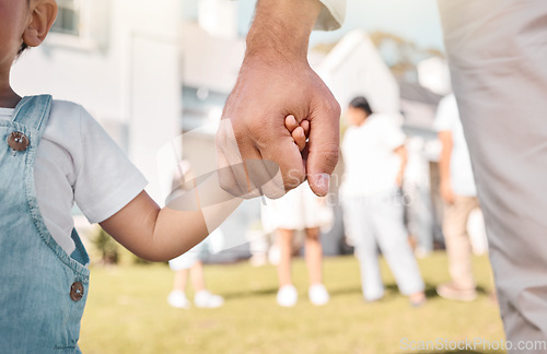 Image of Closeup, parent or child holding hands in new home or real estate as family bonding with love or care. Support, embrace or guardian with a young kid with affection moving in to house property grass