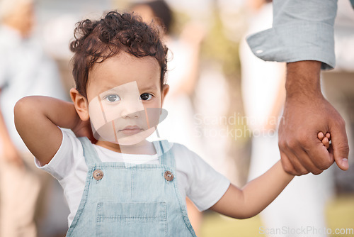 Image of Portrait, parent or face of child holding hands in new home or real estate as family bonding with love or care. Support, embrace or father with young kid with affection moving in to house property