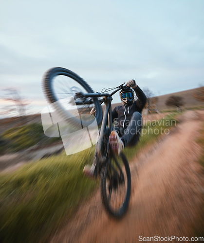 Image of Cycling, danger and a man in nature with a motorbike for travel, bicycle speed and action on the dirt road. Sport, summer and biker with a motorcycle in the countryside for vacation or power